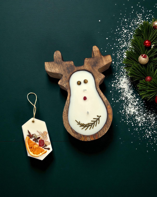 Wooden reindeer-shaped candle