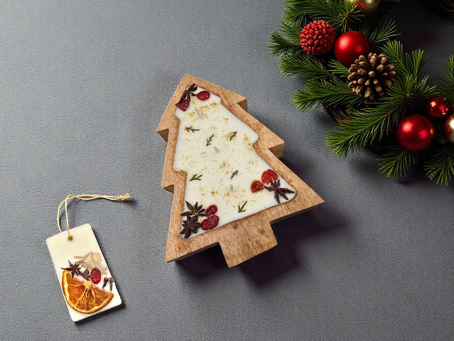 Wooden Christmas tree decoration with a tag on a gray background